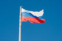 Russian state flag waving in the wind against the 