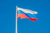 Russian state flag waving in the wind against the 