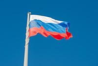 Russian state flag waving in the wind against the 
