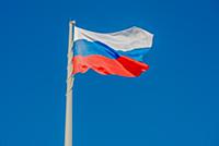 Russian state flag waving in the wind against the 