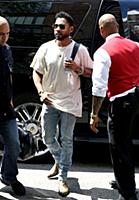 Miguel arrives at a downtown hotel in New York Cit
