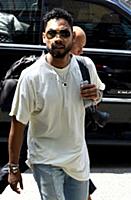 Miguel arrives at a downtown hotel in New York Cit