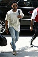 Miguel arrives at a downtown hotel in New York Cit
