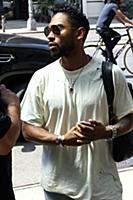 Miguel arrives at a downtown hotel in New York Cit