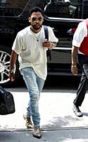 Miguel arrives at a downtown hotel in New York Cit