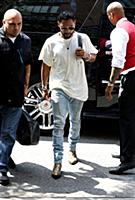 Miguel arrives at a downtown hotel in New York Cit