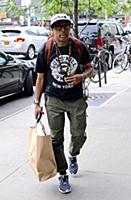 Spike Lee arrives at a downtown hotel wearing a ts