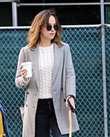 Actress Dakota Johnson walks her dog Zeppelin in t