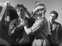 Кадр из фильма 'Последний хлеб', СССР, 1963. На фо