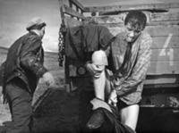 Кадр из фильма 'Последний хлеб', СССР, 1963. На фо