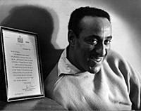 Ray Ellington, 1915-1985, at home in London, after