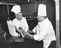 Queen Mary Chef Mr J. Pearce, assisted by second c