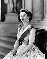 The Queen is seen in a yellow tulle evening gown d