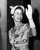 Queen Elizabeth II smiles and waves to the crowd a
