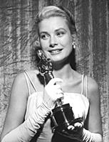Cheek to cheek. Oscar and beautiful Grace Kelly.
