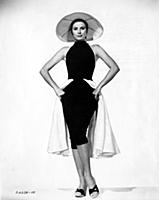 Grace Kelly models an outfit of toredor pants for 