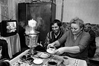 Man and woman making tea with a samovar.  Vazhini,