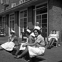 Off-duty nurses relaxing in the sunshine during a 