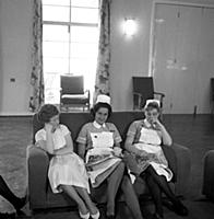 Off-duty nurses relaxing in the common-room during