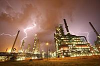 Thunderstorm and lightning above petrochemical ind