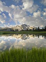 Mammoth Peak and scattered clouds reflected season