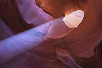 Eroded sandstone and ray of sunlight in Antelope C