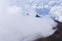 Mount Etna Volcano, surrounded by clouds, Sicily, 