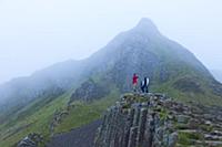 Tourists on Giant's Causeway in the mist, UNESCO W