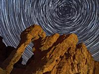 Star trails over Elephant Rock at night, Valley of