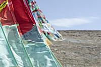 China, Tibet, Close view of the waving colorful pr