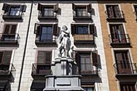 Spain, Madrid, Statue and apartments in the Plaza 