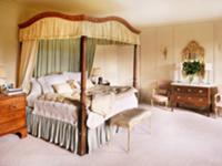 Antique four-poster bed with canopy in traditional