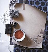 Black and white mood board of paper, washi tape, s