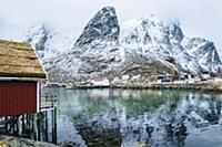 Buildings and snowcapped mountains, Reine, Lofoten