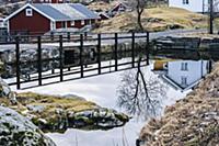 Buildings reflected in water, Reine, Lofoten, Norw
