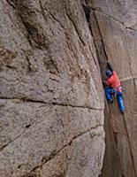 Climber trad climbing, Pine Creek, Bishop, Califor