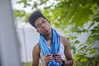 Teenage boy with afro flat top hairstyle sticking 