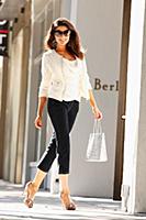 A young brunette woman on a shopping trip in Miami