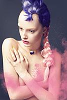 A young woman with a purple and pale pink hair pie