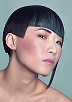An oriental woman with an unusual asymmetric hairs
