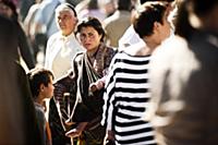 Romania / Negreni / 2014 / Homeless women carries 