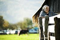 Romania / Negreni / 2014 / Local woman watching th
