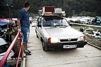 Romania / Negreni / 2014 / Packed Dacia goes over 