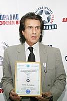 Итальянский певец Тото Кутуньо.