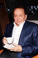 Советский и российский телеведущий Александр Масля