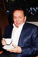 Советский и российский телеведущий Александр Масля