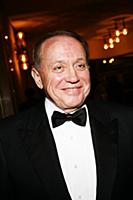 Советский и российский телеведущий Александр Масля