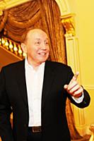 Советский и российский телеведущий Александр Масля