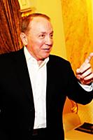 Советский и российский телеведущий Александр Масля
