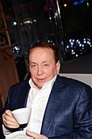 Советский и российский телеведущий Александр Масля